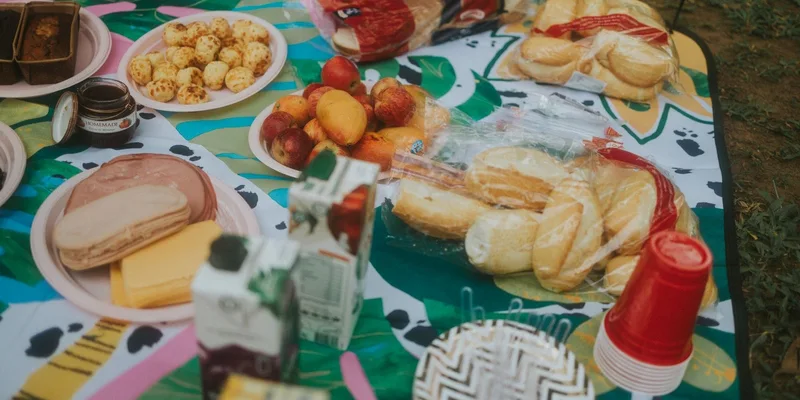 High angle view of a vibrant picnic spread with assorted foods
